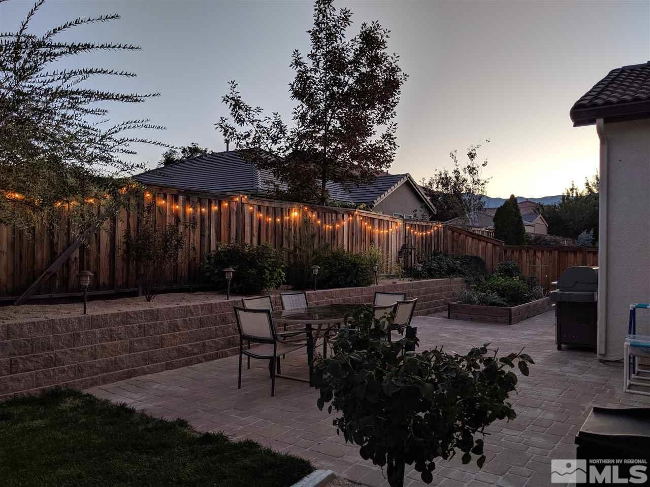 420 Pesaro Way Reno, NV 89521 - Photo 21 of 25 a view of a backyard with sitting area