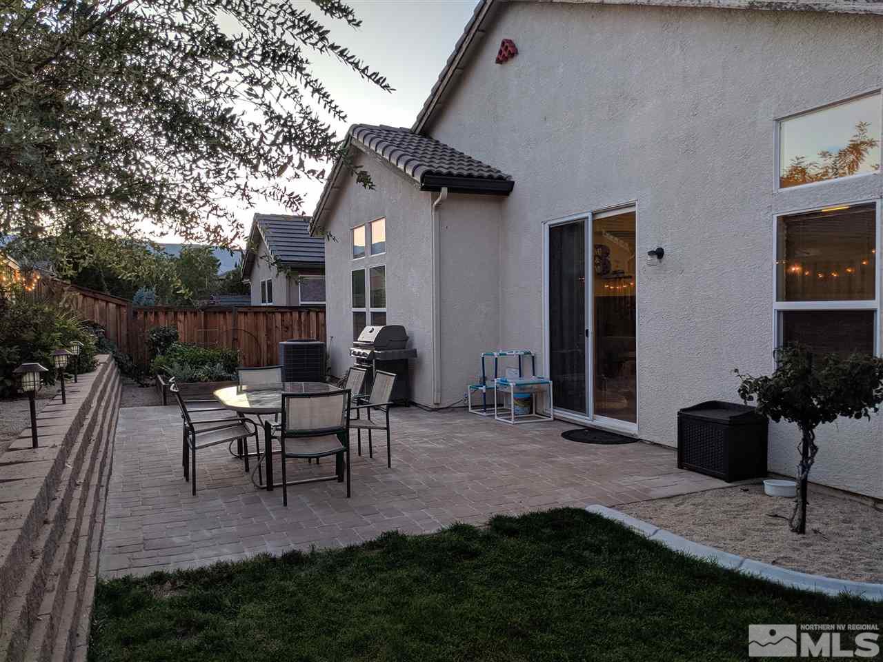 420 Pesaro Way Reno, NV 89521 - Photo 23 of 25 a view of a house with backyard and sitting area