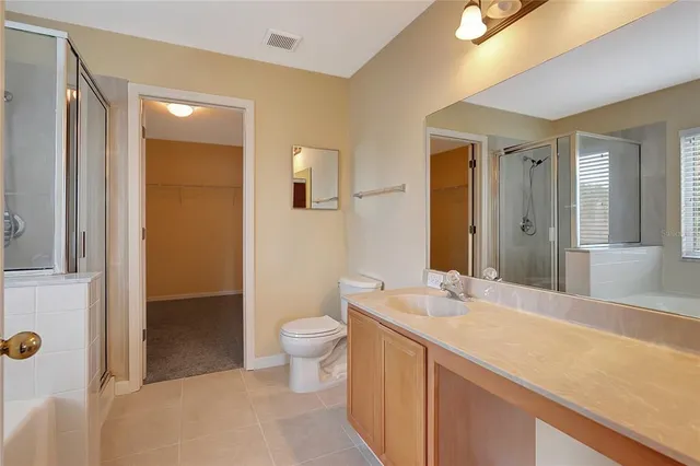 a white bath tub sitting next to a window