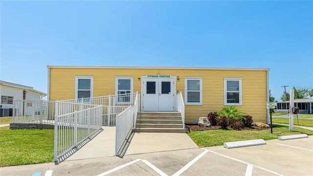 a view of an chairs and tables in the patio