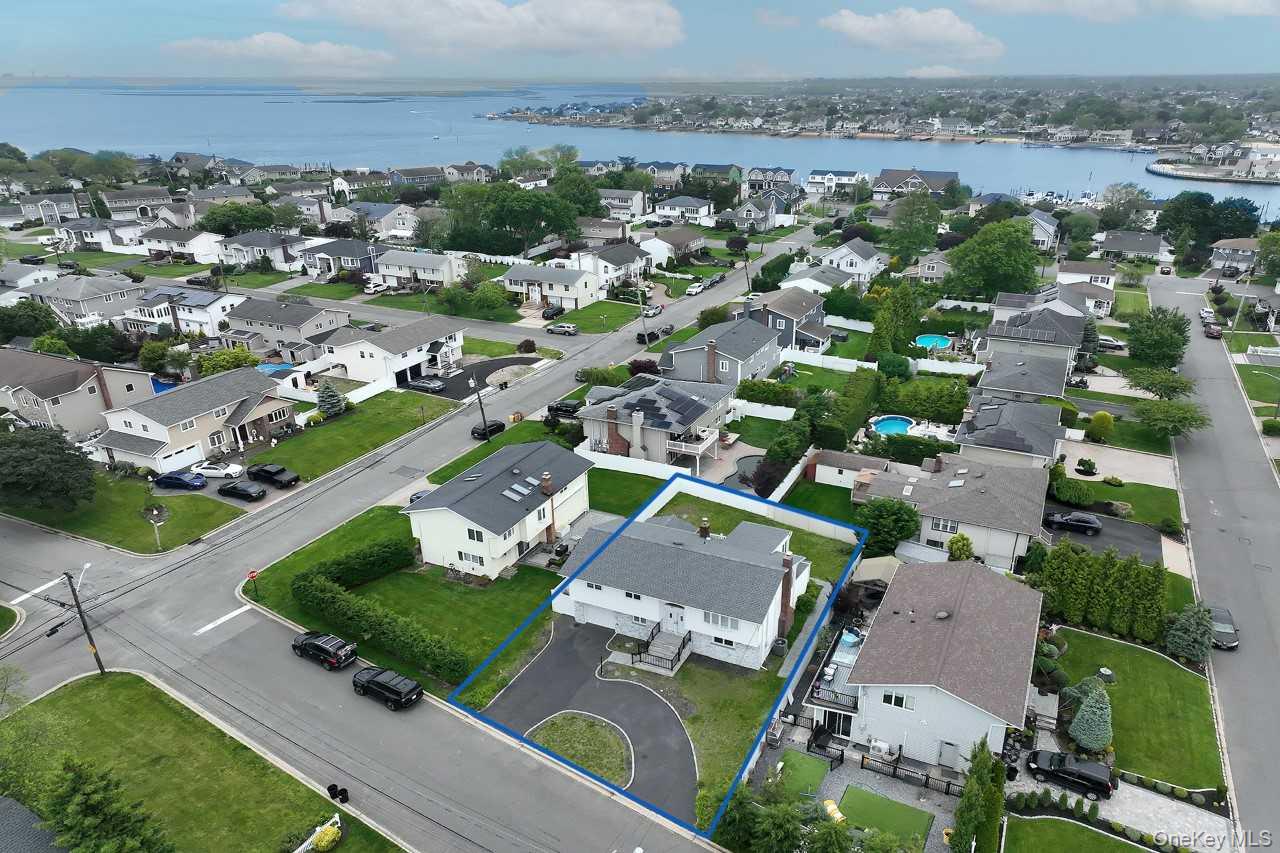 107 Beverly Road Massapequa, NY 11758 - Photo 36 of 41 an aerial view of a city