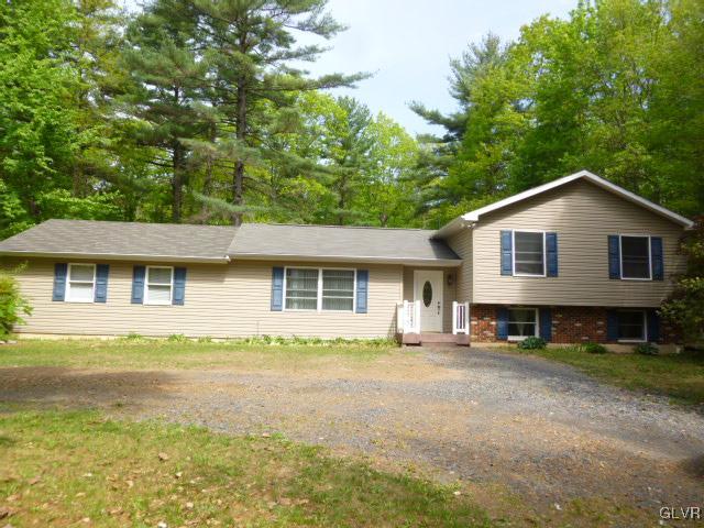 268 Sundance Road Effort, PA 18330 - Photo 1 of 28 a front view of a house with a garden