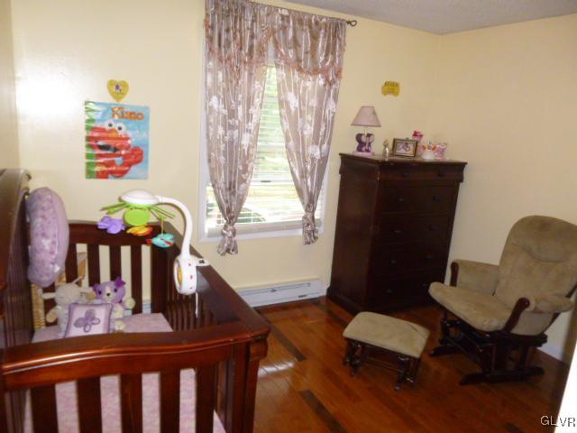 268 Sundance Road Effort, PA 18330 - Photo 13 of 28 a living room with furniture and wooden floor