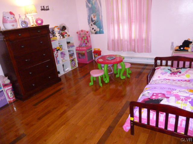268 Sundance Road Effort, PA 18330 - Photo 19 of 28 a bedroom with a bed and a dresser