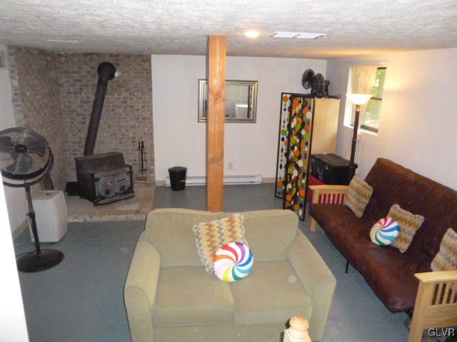 268 Sundance Road Effort, PA 18330 - Photo 21 of 28 a living room with furniture and a mirror