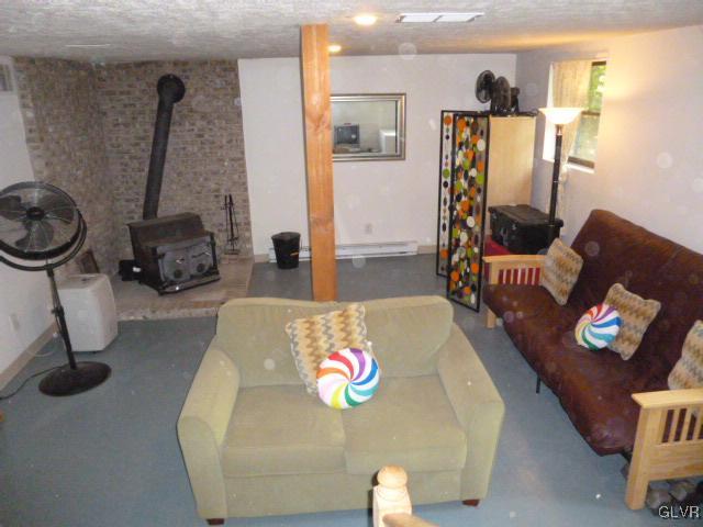 268 Sundance Road Effort, PA 18330 - Photo 22 of 28 a living room with furniture and a flat screen tv