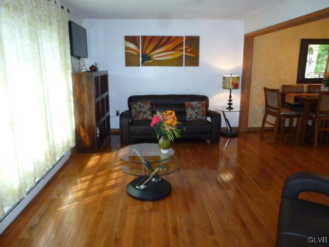 268 Sundance Road Effort, PA 18330 - Photo 4 of 28 a living room with furniture and a fireplace