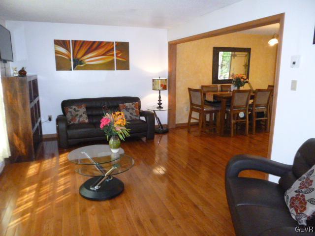 268 Sundance Road Effort, PA 18330 - Photo 6 of 28 a living room with furniture and wooden floor