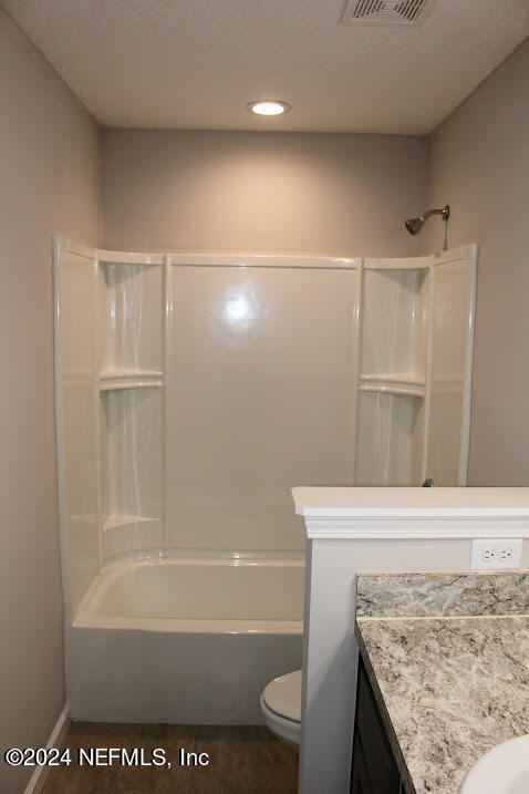 4152 Quiet Creek Loop, Unit 134 Middleburg, FL 32068 - Photo 16 of 42 a bathroom with a bath tub