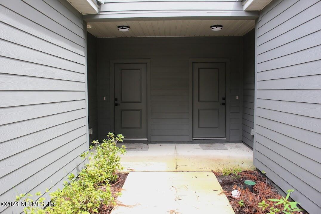 4152 Quiet Creek Loop, Unit 134 Middleburg, FL 32068 - Photo 2 of 42 a view of backyard with pathway