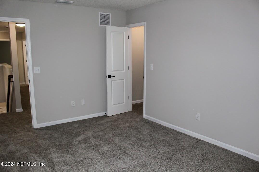 4152 Quiet Creek Loop, Unit 134 Middleburg, FL 32068 - Photo 26 of 42 a view of an empty room