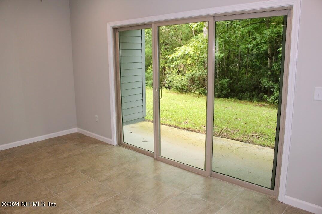 4152 Quiet Creek Loop, Unit 134 Middleburg, FL 32068 - Photo 29 of 42 a view of an empty room and window