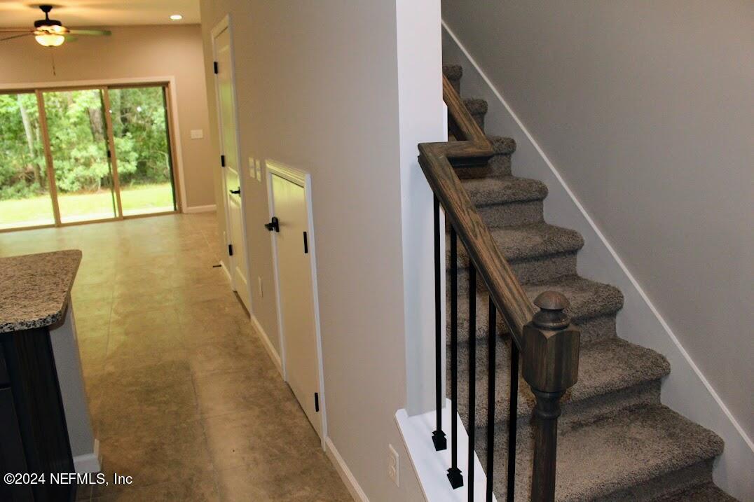 4152 Quiet Creek Loop, Unit 134 Middleburg, FL 32068 - Photo 9 of 42 a view of entryway and hall with wooden floor