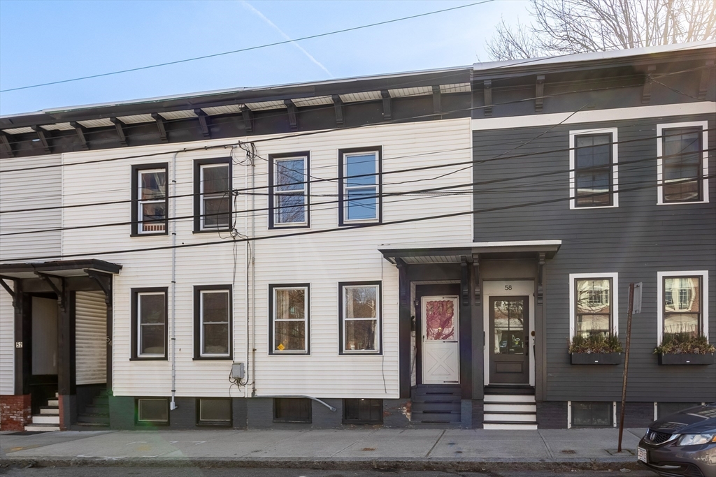 56 Spring Street, Unit 56 Cambridge, MA 02141 - Photo 2 of 14 a front view of a building