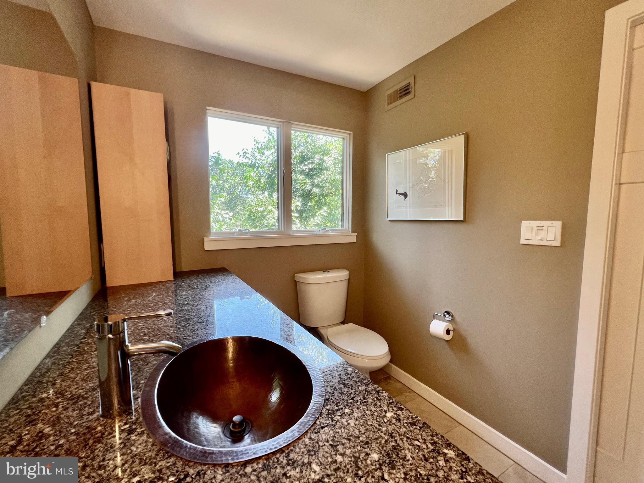 29 Rolling Road Wynnewood, PA 19096 - Photo 16 of 27 Ensuite Main Bath with Copper Sink
