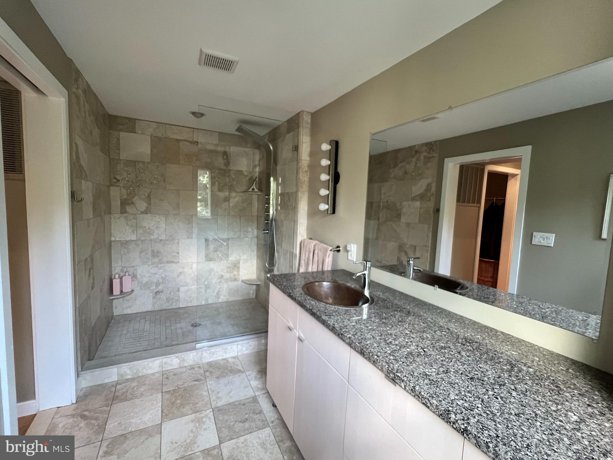 29 Rolling Road Wynnewood, PA 19096 - Photo 18 of 27 Expansive stone vanity countertop