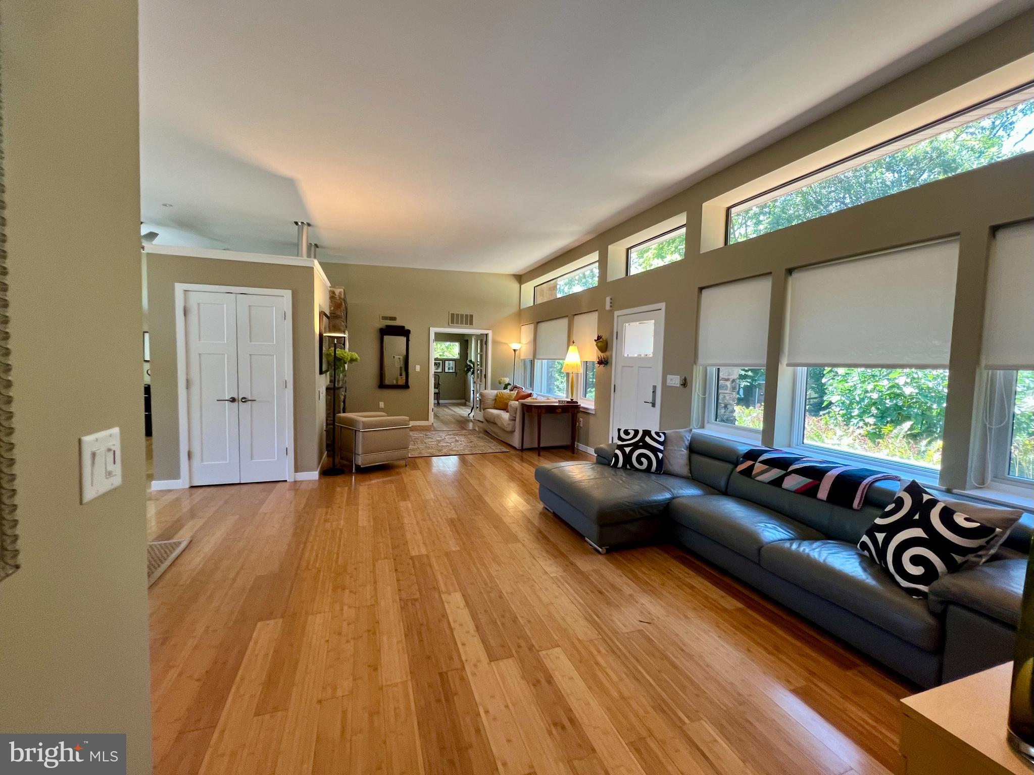 29 Rolling Road Wynnewood, PA 19096 - Photo 2 of 27 Open Living Rm w/ Wall of Windows & Bamboo Floors