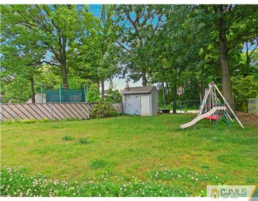 123 Winthrop Road Edison, NJ 08817 - Photo 17 of 22 a view of a backyard with a barn and plants