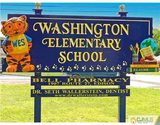 123 Winthrop Road Edison, NJ 08817 - Photo 21 of 22 a street sign on a wall
