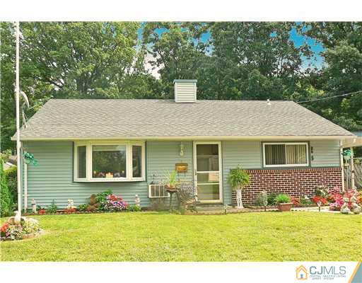 123 Winthrop Road Edison, NJ 08817 - Photo 4 of 22 a view of a house with a yard