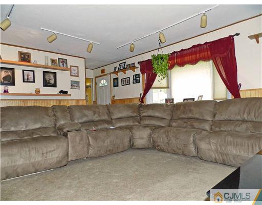 123 Winthrop Road Edison, NJ 08817 - Photo 9 of 22 a view of a living room with furniture