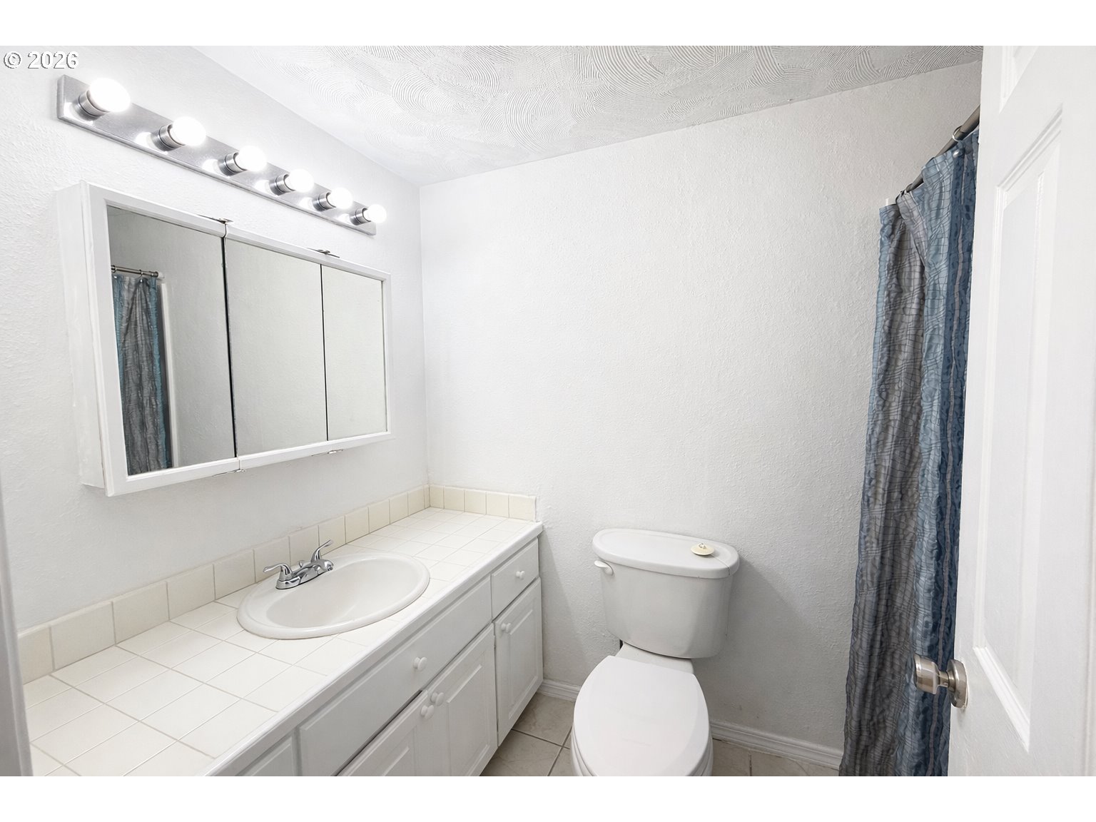 200 Roth Avenue Amity, OR 97101 - Photo 12 of 13 a bathroom with a sink a toilet and mirror