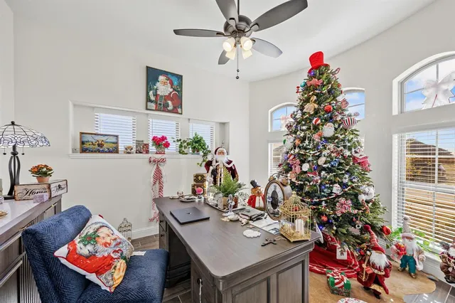 a view of a workspace with furniture