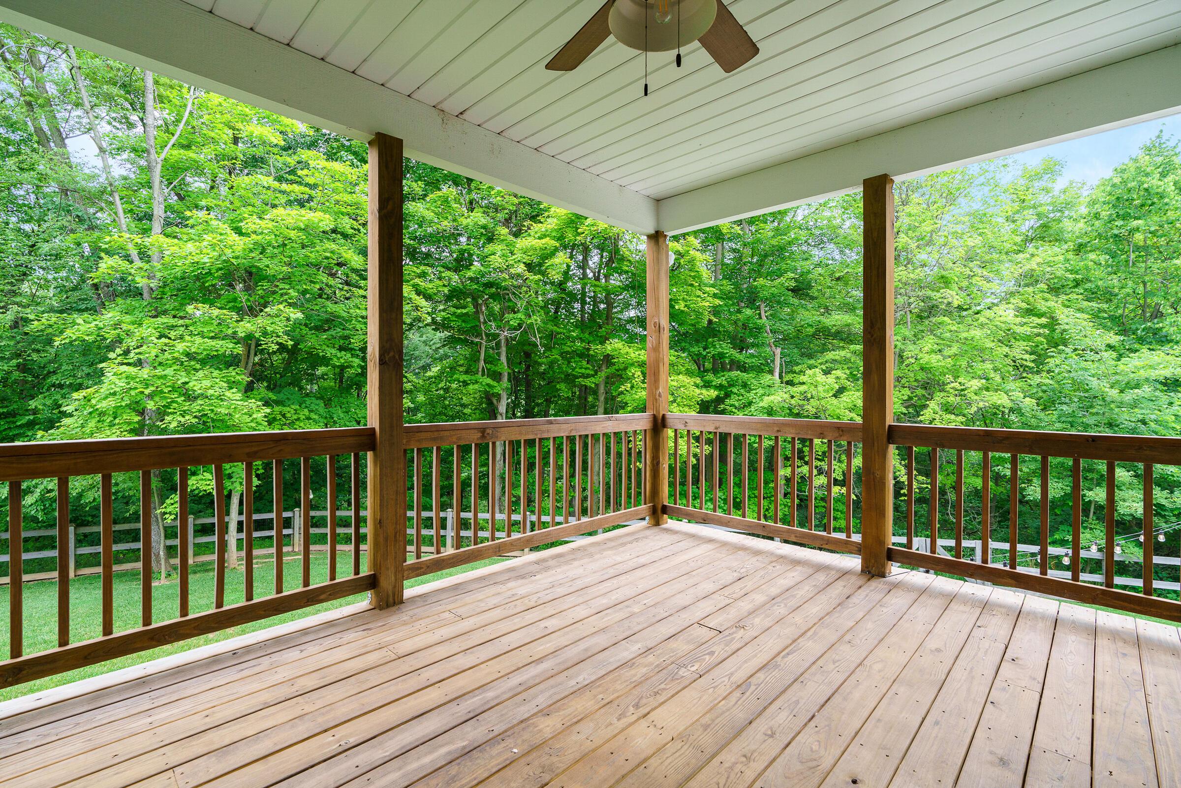 701 Ross Road Sunbury, OH 43074 - Photo 21 of 74 The raised deck offers a beautiful extension of living space from the great room to the great outdoors