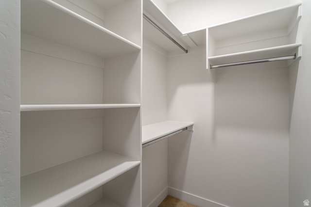 2768 Becco Trail, Unit 63 St. George, UT 84770 - Photo 17 of 27 Walk in closet featuring carpet