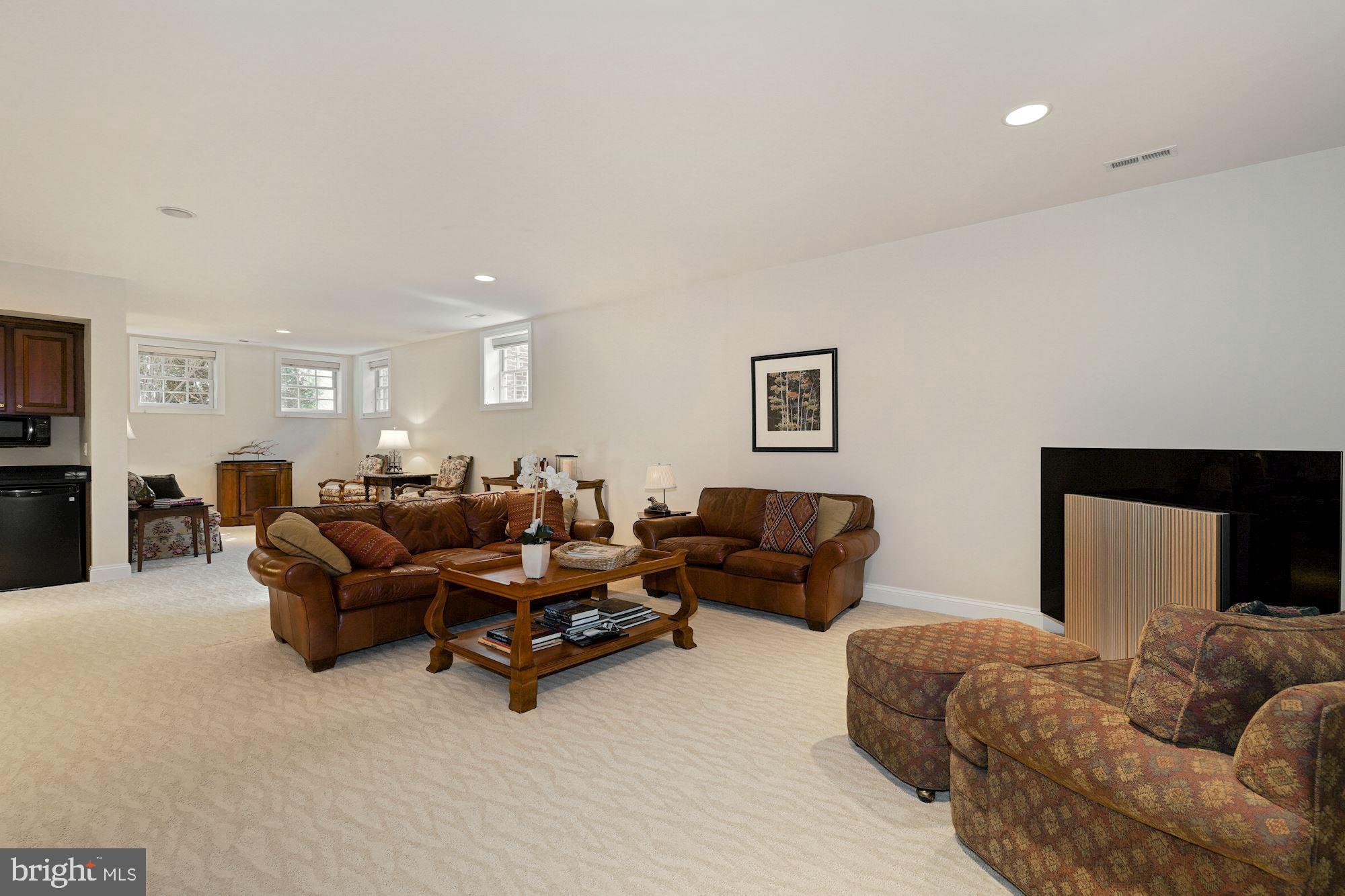 5910 Bradley Boulevard Bethesda, MD 20814 - Photo 23 of 42 Huge lower level family room