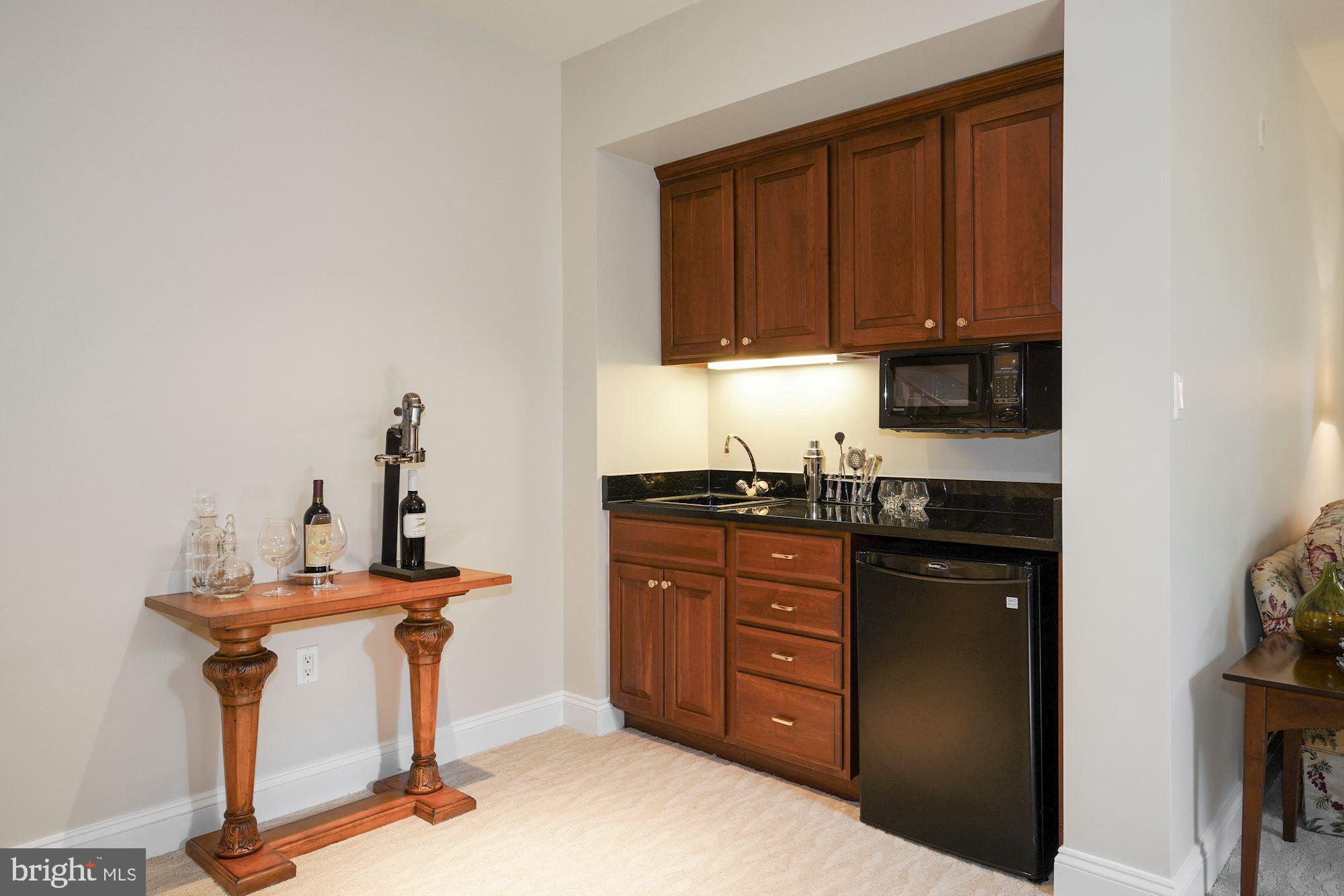 5910 Bradley Boulevard Bethesda, MD 20814 - Photo 25 of 42 Wet bar in lower level family room