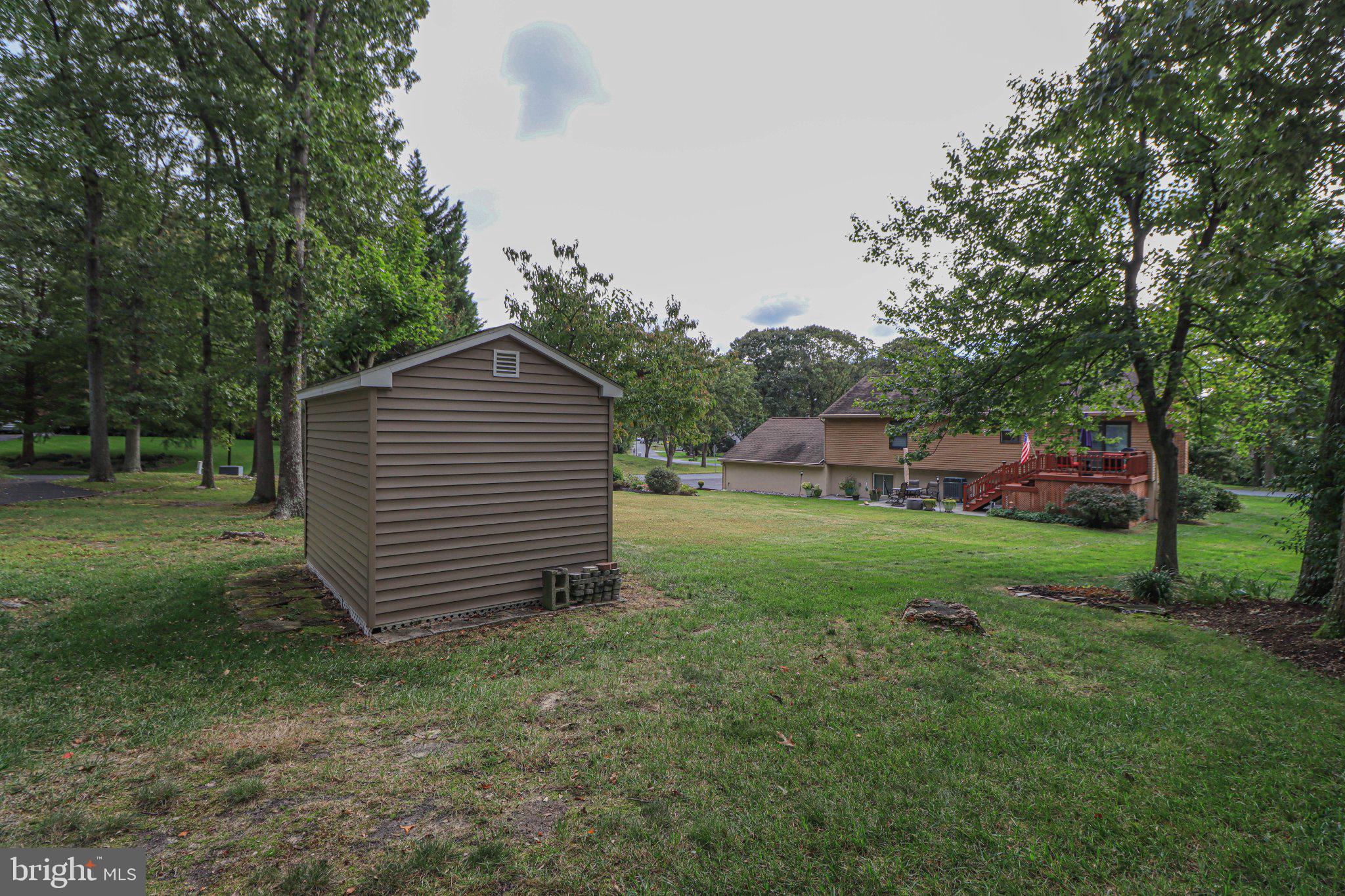 7796 Poplar Grove Road Severn, MD 21144 - Photo 22 of 23 Garden Shed and yard