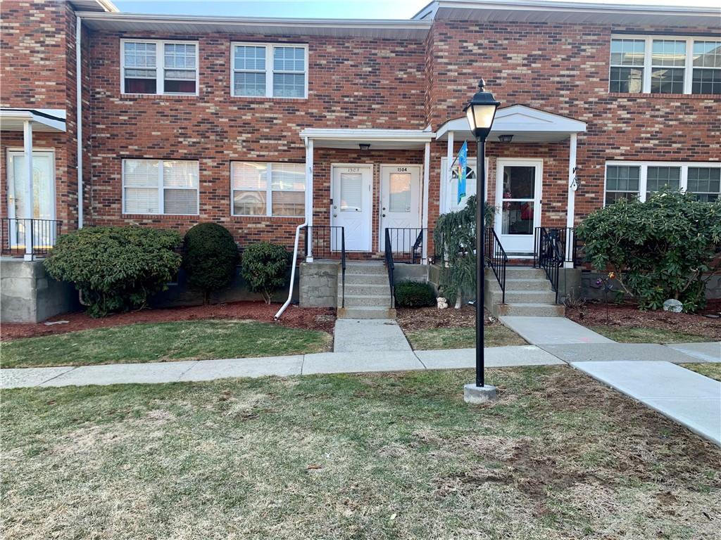 276 Temple Hill Road, Unit 1504 New Windsor, NY 12553 - Photo 1 of 1 a front view of a house with garden