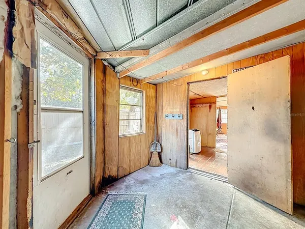 a view of entryway with wooden floor
