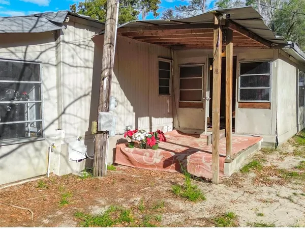 a view of house with a outdoor space