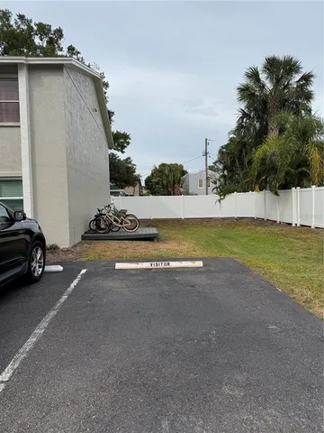 a view of a back yard of the house