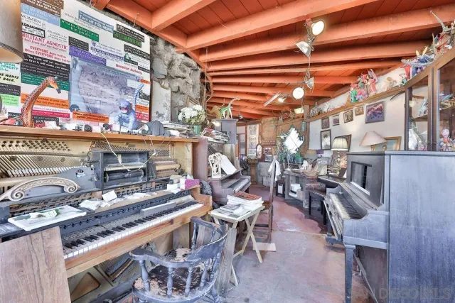 a view of a chairs and tables in patio