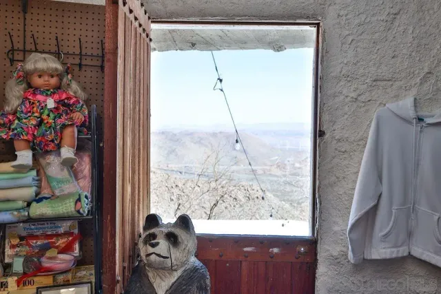 a view of a backyard with sitting area