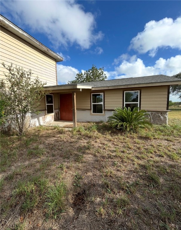 403 County Road 149 Alice, TX 78332 - Photo 5 of 17 a front view of house with yard and trees around