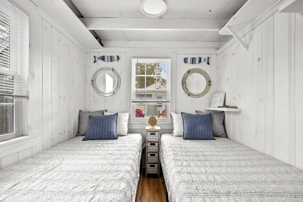 262 Old Wharf Road, Unit 103 Dennis, MA 02639 - Photo 15 of 30 a bedroom with bed and a window