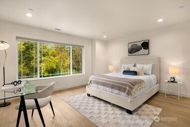 2411 Southwest 346th Street Federal Way, WA 98023 - Photo 20 of 30 a bedroom with a bed and large windows