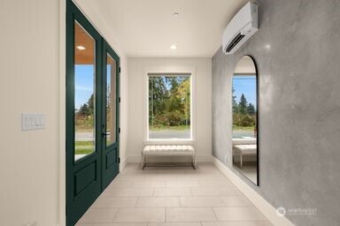 2411 Southwest 346th Street Federal Way, WA 98023 - Photo 3 of 30 a view of a hallway with furniture and windows