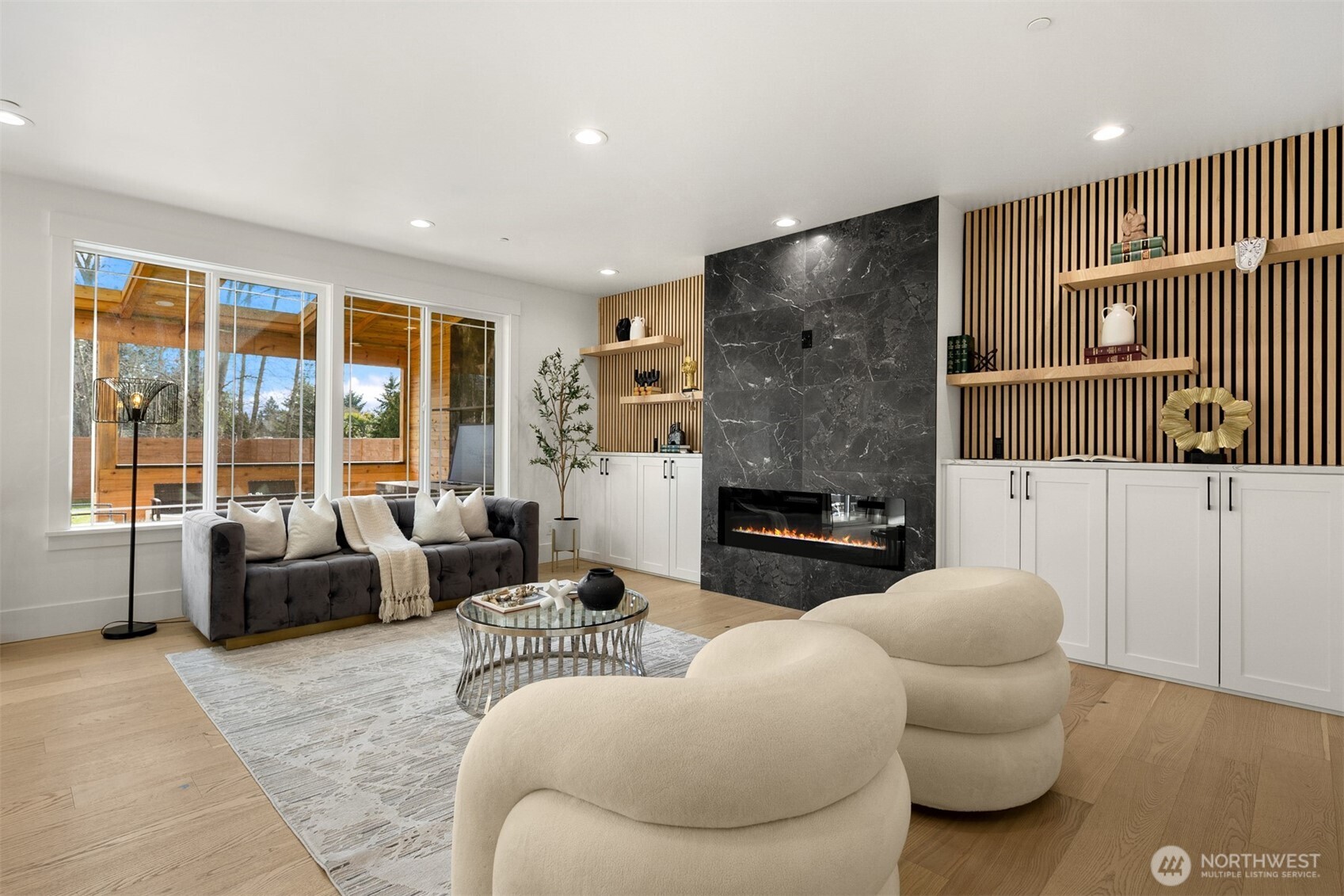 2411 Southwest 346th Street Federal Way, WA 98023 - Photo 6 of 30 a living room with furniture and a floor to ceiling window