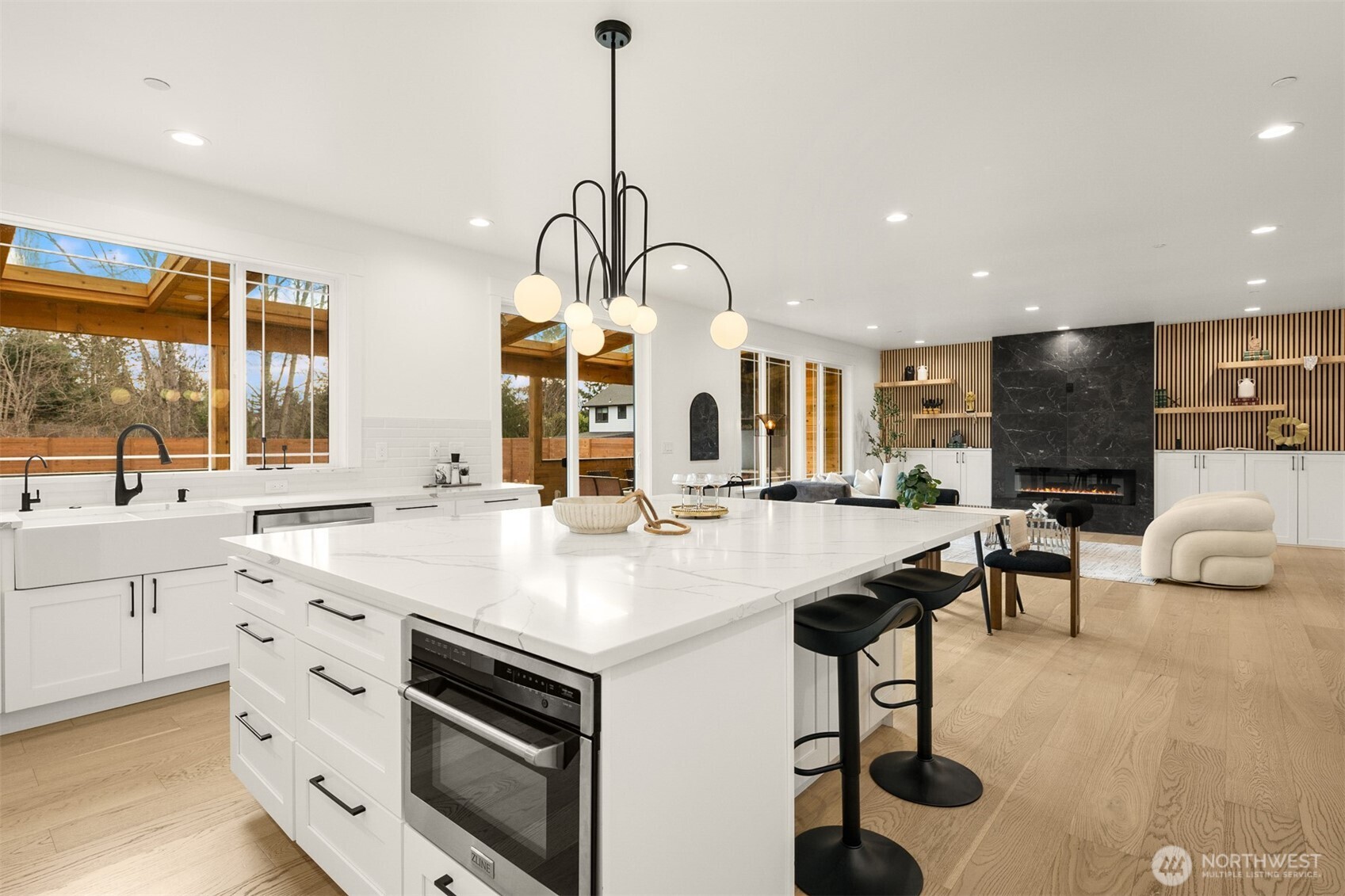 2411 Southwest 346th Street Federal Way, WA 98023 - Photo 10 of 30 a kitchen with stainless steel appliances kitchen island a chandelier