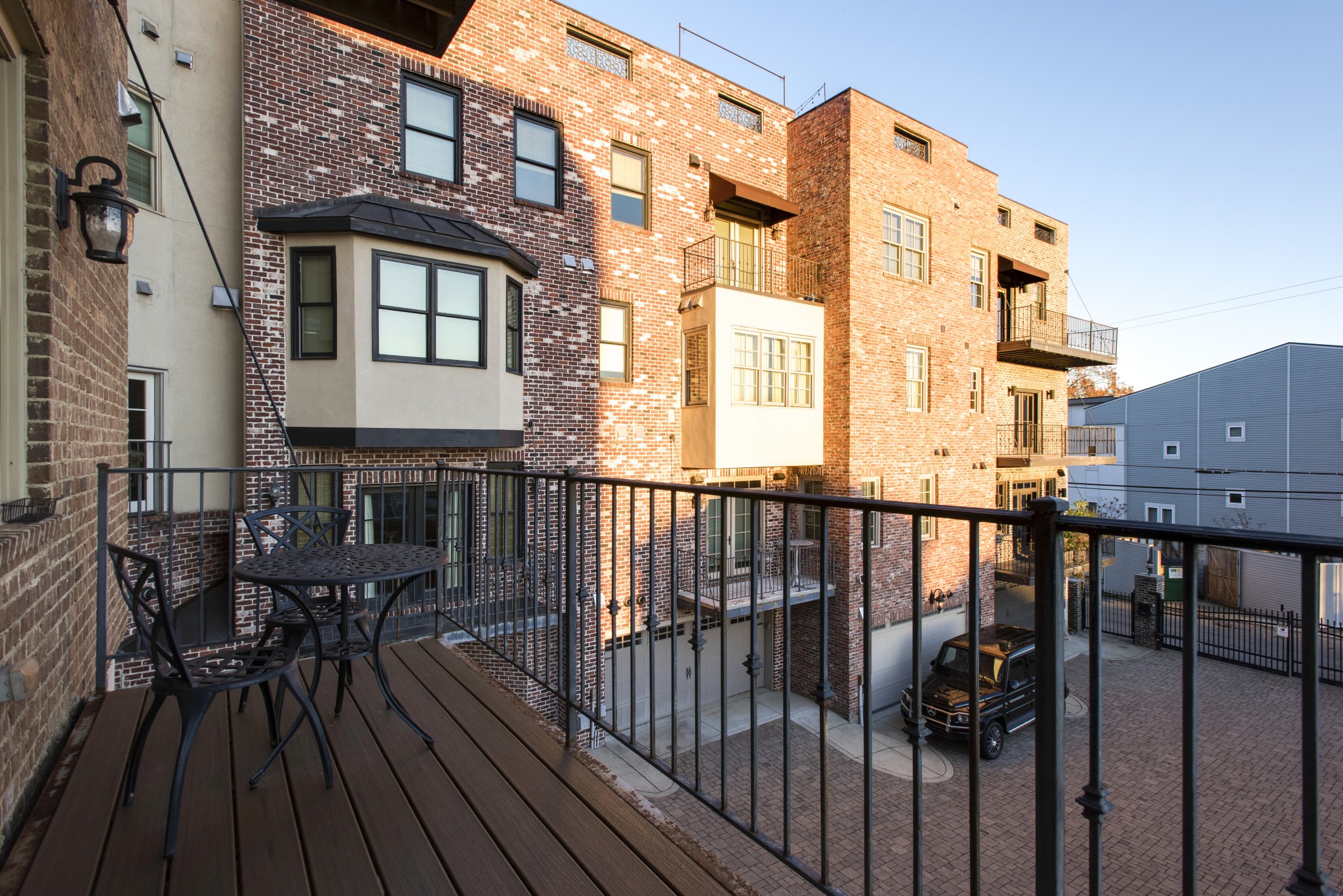 3127 Parthenon Avenue Nashville, TN 37203 - Photo 14 of 30 a view of a balcony with chairs and wooden floor