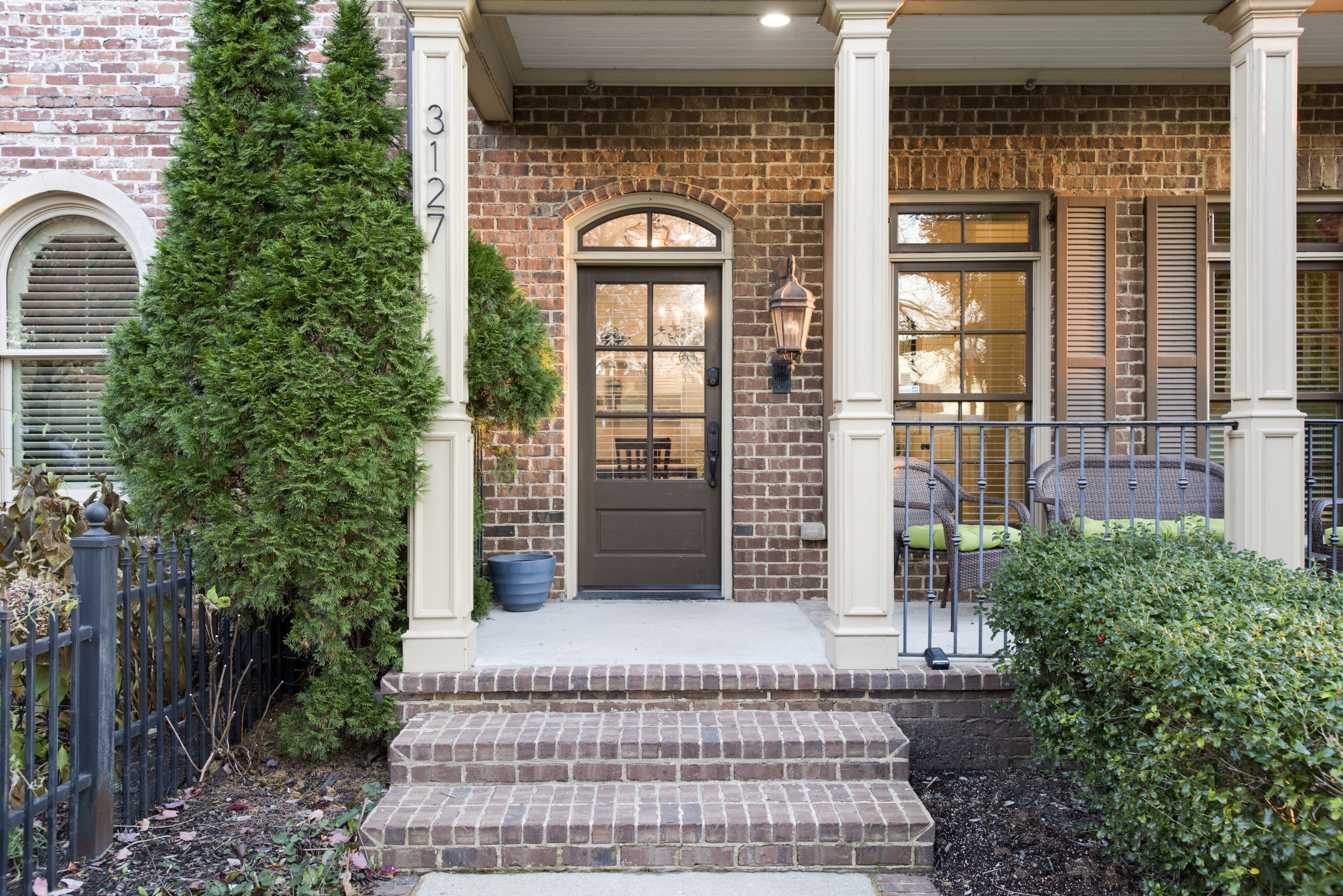 3127 Parthenon Avenue Nashville, TN 37203 - Photo 4 of 30 front view of a brick house with a large window