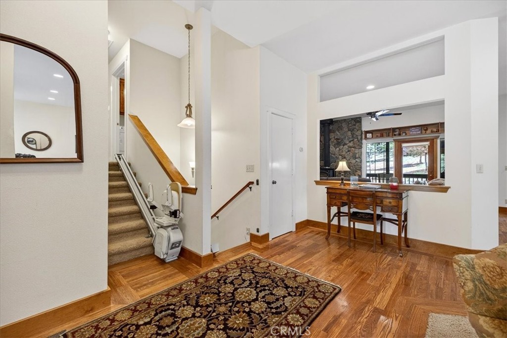 915 Golf Club Road Westwood, CA 96137 - Photo 12 of 67 a view of a livingroom with wooden floor and furniture