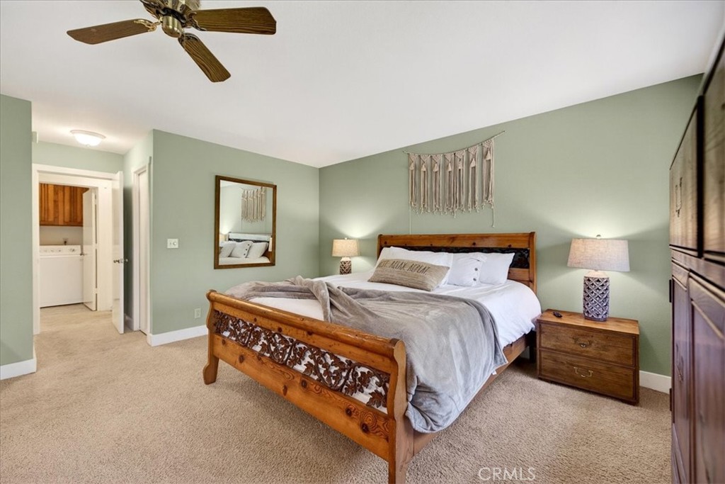 915 Golf Club Road Westwood, CA 96137 - Photo 27 of 67 a bedroom with a bed and cabinets