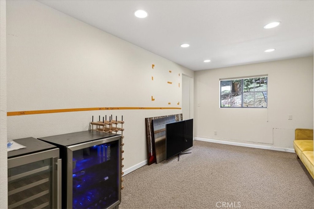 915 Golf Club Road Westwood, CA 96137 - Photo 45 of 67 a kitchen with stainless steel appliances granite countertop a stove a sink and a refrigerator with wooden floor