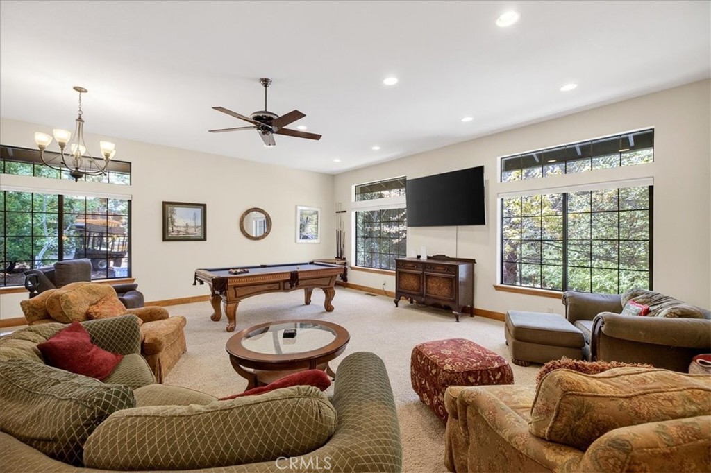 915 Golf Club Road Westwood, CA 96137 - Photo 8 of 67 a living room with furniture and a flat screen tv